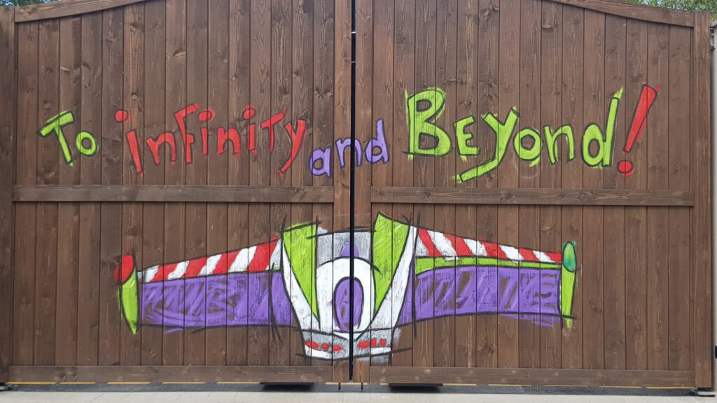 Buzz Lightyear wings backdrop, now found within Worlds of Pixar
